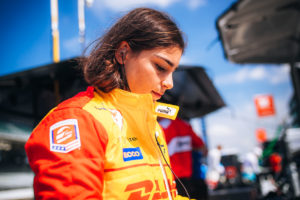 Jamie Chadwick in racing suit at IMS