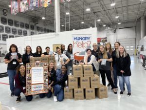 ECCO Employees Volunteer With Pack Away Hunger